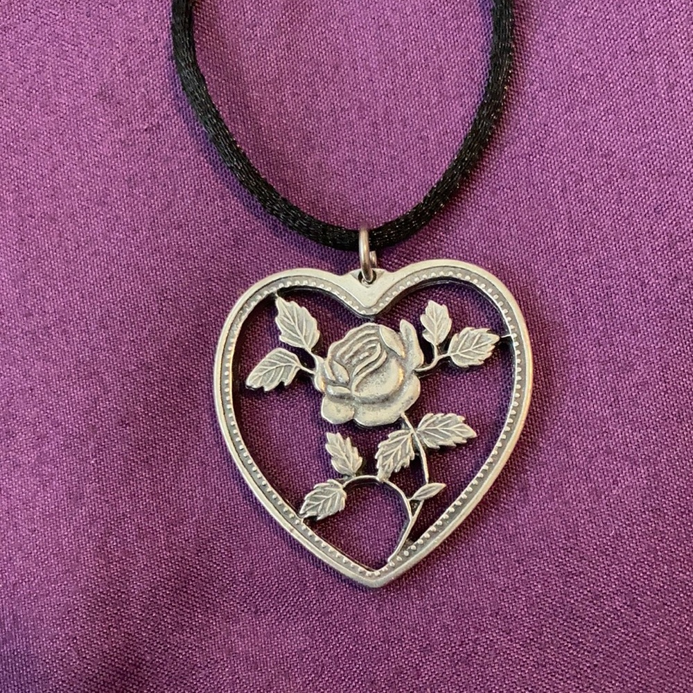 Silver rose cutout heart necklace